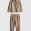 1,5-8 años | Conjunto de chaqueta de jacquard con cremallera y pantalones de chándal