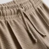 1,5-8 años | Conjunto de chaqueta de jacquard con cremallera y pantalones de chándal