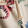 1,5-8 años | Conjunto de sudadera y pantalones de chándal con estampado de dinosaurios