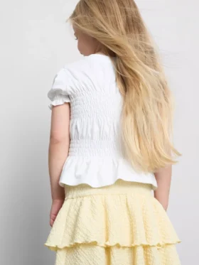 1,5-9 años | Top con peplum fruncido