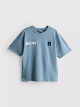 7-15 años | Camiseta azul con cierre