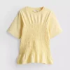 7-15 años | Camiseta con peplum fruncido