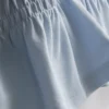 7-15 años | Camiseta con peplum fruncido