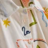 7-15 años | Conjunto de camiseta con detalle de lazo y pantalones cortos
