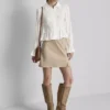 Blusa con bajo fruncido y peplum