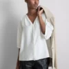 Blusa de manga 3/4 con cuello en V