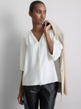Blusa de manga 3/4 con cuello en V