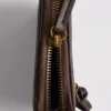 Bolso con cremallera de efecto desgastado