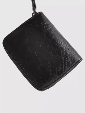 Bolso con cremallera de efecto desgastado
