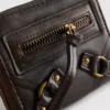 Bolso con cremallera de efecto desgastado