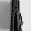 Bolso con cremallera de efecto desgastado