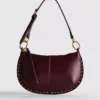 Bolso de hombro con tachuelas de imitación de piel de Paula Echevarría