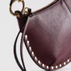 Bolso de hombro con tachuelas de imitación de piel de Paula Echevarría