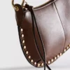 Bolso de hombro con tachuelas de imitación de piel de Paula Echevarría
