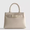Bolso mini con detalle de hebilla