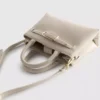 Bolso mini con detalle de hebilla