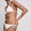 Braguita de bikini con bordado de conchas y lazo lateral