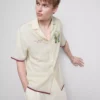 Camisa con cuello rever y estampado paisajístico