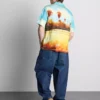 Camisa con cuello rever y estampado paisajístico
