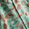 Camisa de manga corta con botones y estampado de pájaros