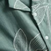 Camisas de manga corta con botones y bordado de hojas