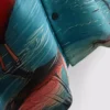 Camisas de manga corta con botones y estampado de flamencos