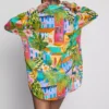 Camisas de playa de algodón estampadas con botones