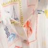 Camisas de playa de algodón estampadas con botones