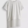 Camiseta asimétrica de algodón con flecos
