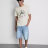 Camiseta con estampado «Paradise Beach»