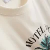 Camiseta con estampado «Paradise Beach»