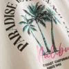 Camiseta con estampado «Paradise Beach»
