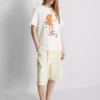 Camiseta de algodón «Croissant» con motivos de volantes y corazones rotos