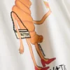 Camiseta de algodón «Croissant» con motivos de volantes y corazones rotos