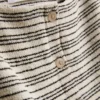 Camiseta de punto a rayas con botones de Paula Echevarría