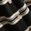 Camiseta de punto a rayas con botones de Paula Echevarría