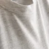 Camiseta larga con bolsillo de parche
