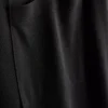 Camiseta larga con bolsillo de parche