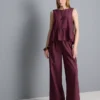 Camiseta sin mangas con bajo peplum a rayas