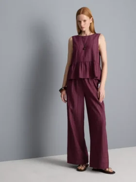 Camiseta sin mangas con bajo peplum a rayas