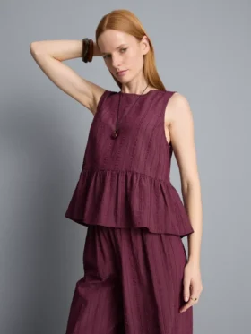 Camiseta sin mangas con bajo peplum a rayas