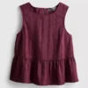 Camiseta sin mangas con bajo peplum a rayas