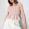 Camiseta sin mangas con bajo peplum fruncido