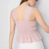 Camiseta sin mangas con bajo peplum fruncido