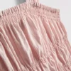 Camiseta sin mangas con bajo peplum fruncido