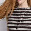 Camiseta sin mangas con botones, con alto porcentaje de algodón