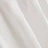 Camiseta sin mangas con inserción bordada