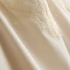 Camiseta sin mangas con ribete de encaje satinado de Paula Echevarría