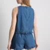 Camiseta sin mangas corta de denim de algodón con volantes