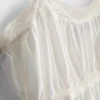 Camiseta sin mangas de algodón con bajo en forma de pañuelo